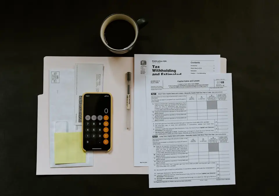 Tax forms and calculator prepared for filing